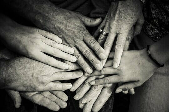 hands stacked together